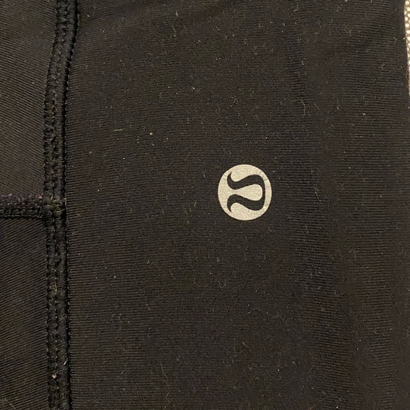 Lulu lemon reversible black and purple leggings - Picture 1 of 4